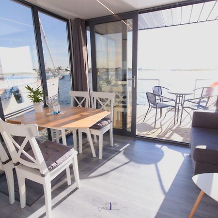 Hausboot Fjord Lacerta Mit Dachterrasse In Wendtorf Exterior photo